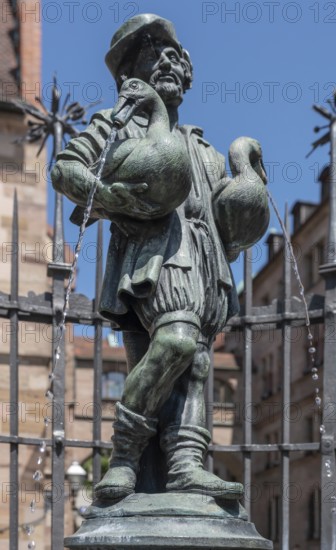 Goose-man fountain, created by the ore caster Pankraz Labenwolf around 1550, Rathausplatz, Nuremberg, Middle Franconia, Bavaria, Germany