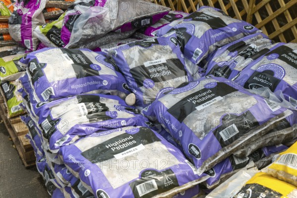 Highland Pebbles bags stacked up at Lowden garden centre, Wiltshire, England, UK