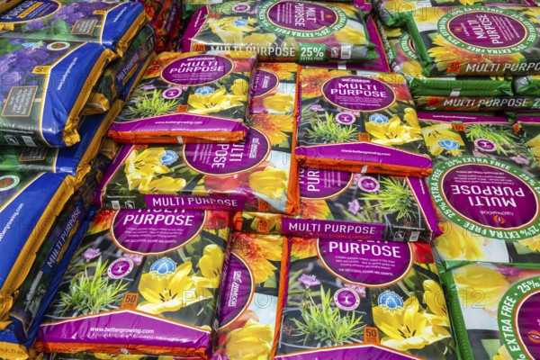Multi Purpose compost bags stacked up at Lowden garden centre, Wiltshire, England, UK