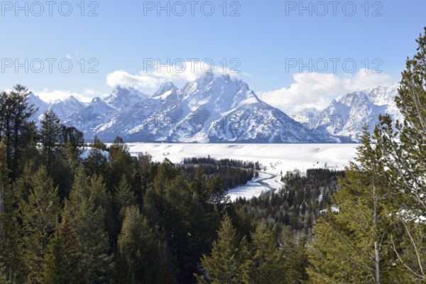View over the Snake River... Teton Range (Rocky Mountains), impressive landscape, a river valley, high snow-capped mountains behind, Grand Teton area, Wyoming, North America, United States of America