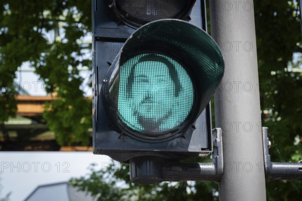 Portrait of Friedrich Engels on a pedestrian traffic light in Wuppertal, Germany