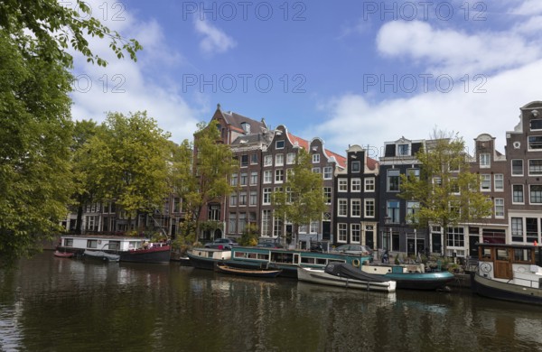 Holland, Amsterdam canals with scenic bridges and historic city center, UNESCO World Heritage site