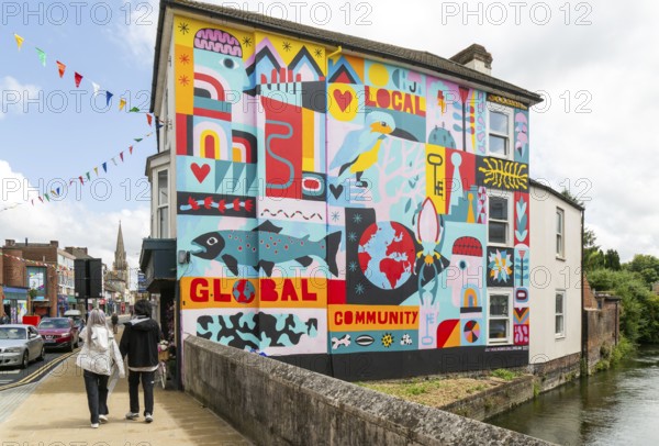 Colourful mural on wall of building by Salisbury Civic Society 2023, Fisherton Street, Salisbury, Wiltshire, England, UK