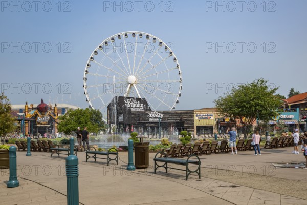 The Wheel ferris wheel behind the Ole Smoky Moonshine store at The Island recreation center in Pigeon Forge, Tennessee