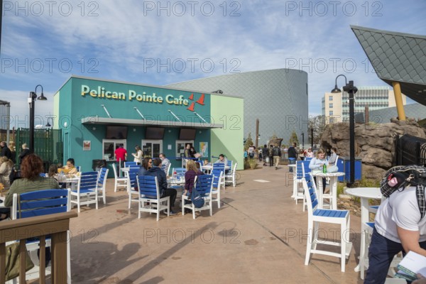 Visitors eating at the Pelican Pointe Cafe in the Mississippi Aquarium on the gulf coast at Biloxi, Mississippi