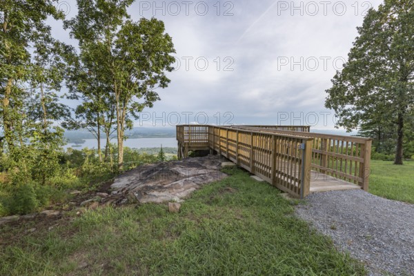Wooden deck overlooks Weiss Lake at Cheyenne Rock Village near Leesburg, Alabama