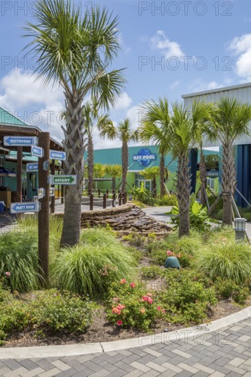 Sign directs guests to different attractions at Ocean Adventures Marine Park in Gulfport, Mississippi