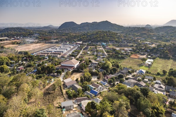 View from the top of the Guan Yin (Goddess of Mercy) statue at Wat Huay Pla Kang Temple in Chiang Rai province of Northern Thailand shows the surrounding rural countryside