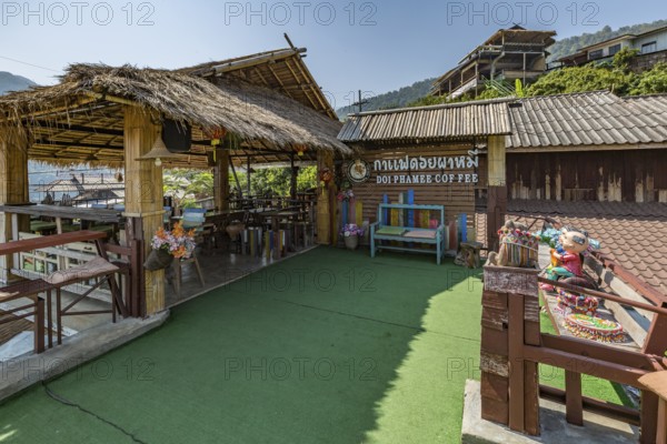 Stairs lead down to the Doi Phamee coffee shop and restaurant in Mae Sai district of Chiang Rai, Thailand