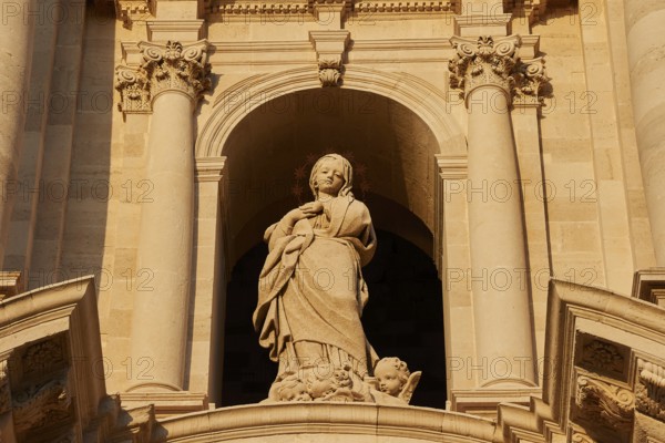 Cathedral of Syracuse, detail of a sculpture on the façade of a historic building with columns, Ortigia Island, Isola di Ortigia, Historic Centre, Syracuse, Sicily, Italy