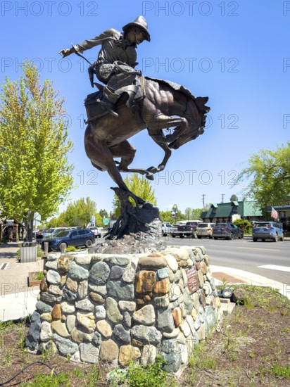 Bronze sculpture Attitude Adjustment by Austin Barton, Rodeo horse-rider, Joseph, Oregon, USA, North America