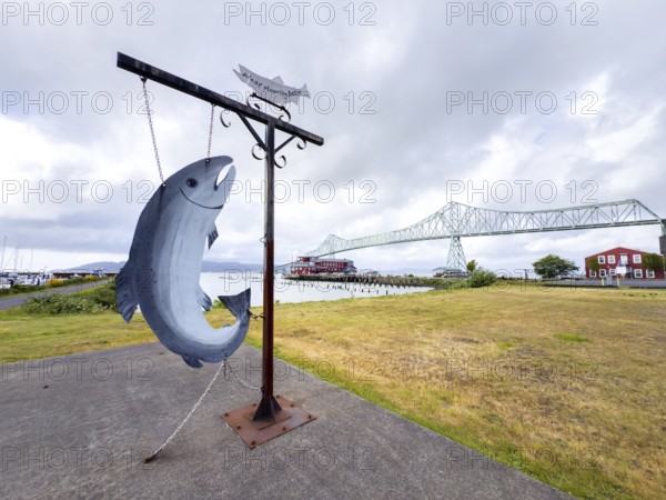 Fish sculpture in front of the Astoria Megler Bridge on the Columbia River, Astoria, Oregon, USA, North America