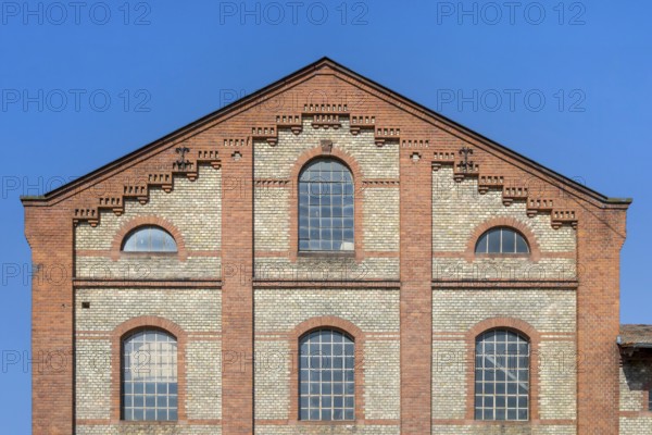 Gable of an old petrol factory, distillery, Germersheim, Palatinate, Rhineland-Palatinate, Germany