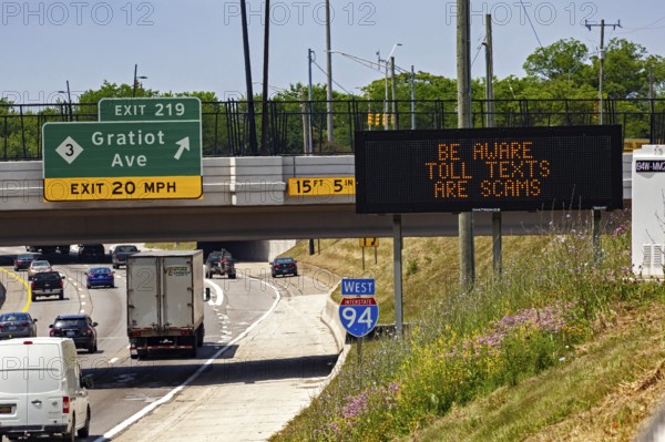 Detroit, Michigan - A message on an electronic road sign on Interstate 94 warns drivers about common scams that demand payment for using toll roads