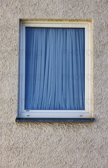 House facade, window with blue curtain, Steyr, Upper Austria, Austria