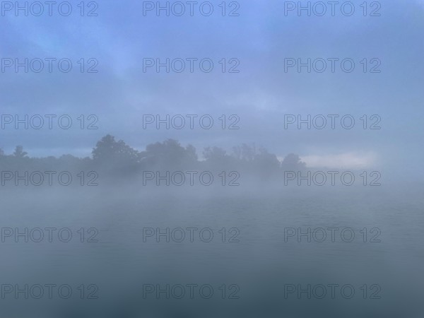 Fog over Lake Starnberg, Bavaria, Germany