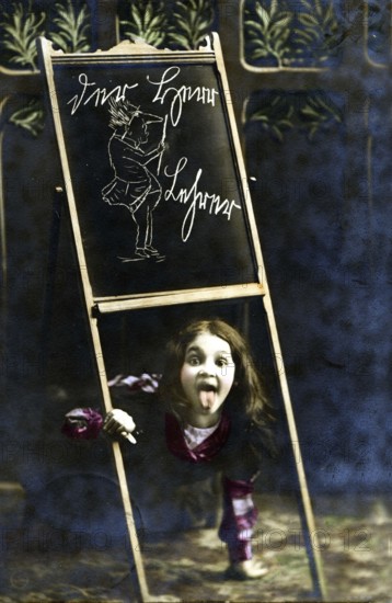 Blackboard caricature, 1920s, girl puts her head through a blackboard, twisted image, humorous and surprising scene, historical photo