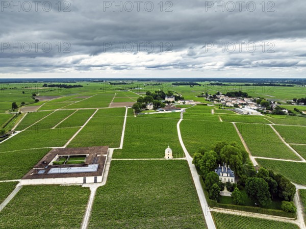 Chateau Latour Vineyard and grape fields around Pauillac from a drone, Bordeaux, Gironde, Nouvelle-Aquitaine, France