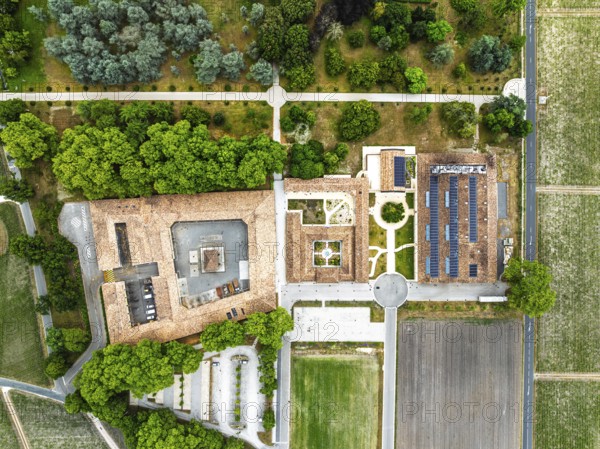 Top Down view over Chateau d'Armailhac Vineyard and grape fields around Pauillac and Gironde Estuary from a drone, Bordeaux, Gironde, Nouvelle-Aquitaine, France