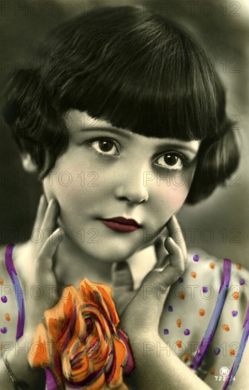 Kitschy portrait of a girl, 1920, Portrait of a girl with flowers in vivid colours, friendly smile, Historical photo