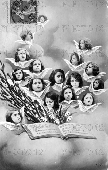 14 Children as angels, 1910, Illustration of angel children whose heads float out of an open book, Historical photo
