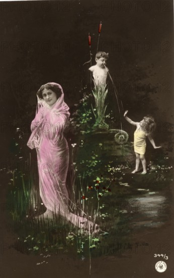 Woman and girl in front of a fountain, 1910s, Woman with pink veil and children in a flowery pond, historical photo