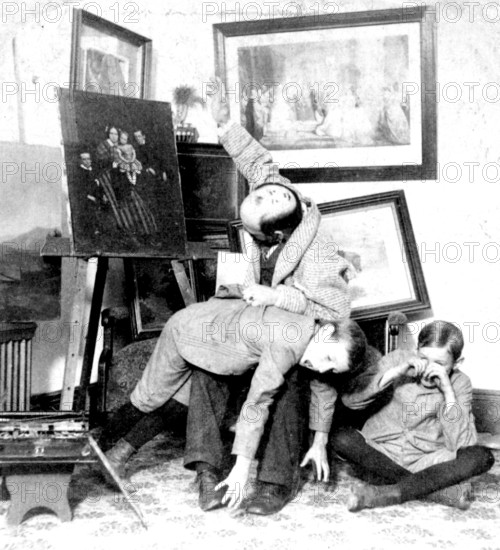 Boys prank shots, 1920s, children in a room with paintings, playing and posing, creative and playful atmosphere, historical photo