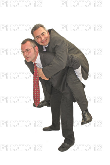 Businessman, two, burden, freeloader, suit and tie, Berlin, Germany, One man piggybacking another in a suit, they seem exuberant and humorous, Historical photo