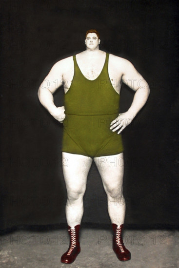 Strong man with a small head, Montage, c. 1930, Germany, A muscular man in a wrestling suit poses confidently, Historical photo