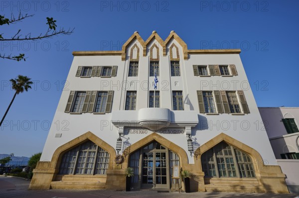 Historic building with striking architecture and symmetrical windows against a blue sky, boutique hotel Albergo Gelsomino, 5-star hotel, Kos Town, Kos, Dodecanese, Greek Islands, Greece