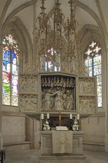 High altar of the Romanesque St. Mary's Church, interior view, colourful stained glass windows, winged altar, folding altar, arts and crafts, decorations, Freyburg, Romanesque Road, Saxony-Anhalt, Germany