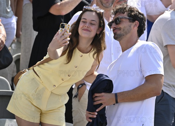 Young woman, fan, visitor, takes selfie with Mats Hummels, grandstand, tennis, ATP 250, BOSS Open 2025, Stuttgart, Baden-Württemberg, Germany
