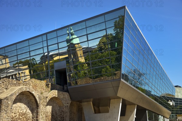 West side of the Darmstadtium congress centre with historic city wall in the centre of Darmstadt, Hesse, Germany