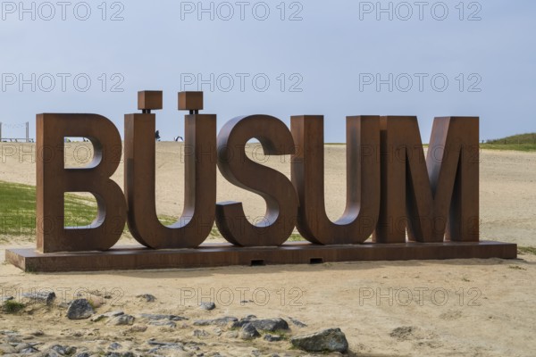 Font with capital letters BÜSUM, sign on the beach, Büsum, North Sea, Schleswig-Holstein, Germany