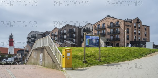 Hotel and apartment building, lighthouse, Am Hafen, Büsum, North Sea, Schleswig-Holstein, Germany