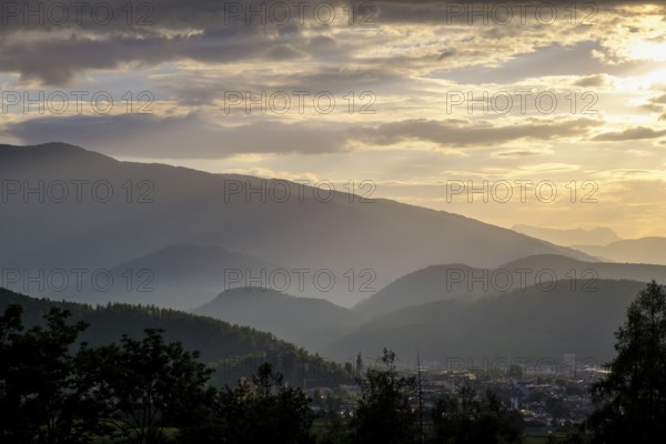 Sunset, evening mood over the Puster Valley, near Bruneck, South Tyrol, Italy