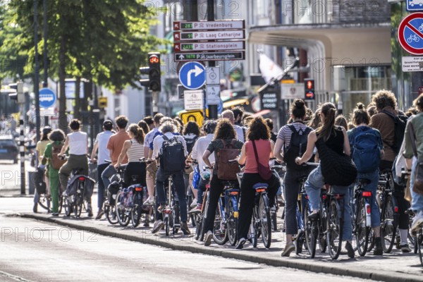 Central cycle path on the Lange Viestraat, lanes for pedestrians, cyclists and local traffic are separated in the city centre, dense traffic, no car/truck traffic, Utrecht, Netherlands