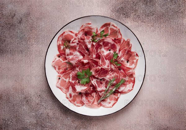 Sliced cured ham, prosciutto, italian dish, delicacy, parma ham, top view, no people