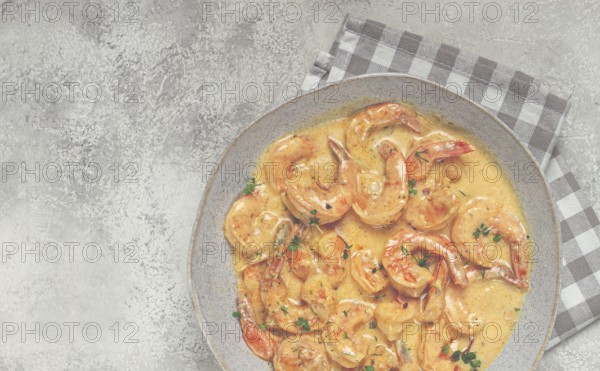 Shrimp in creamy garlic sauce, with spices and herbs