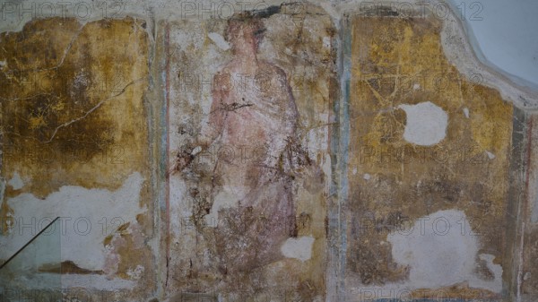 ©Udo Rein, Faded antique wall painting of a figure in warm colours, Casa Romana, Kos Town, Kos, Dodecanese, Greek Islands, Greece