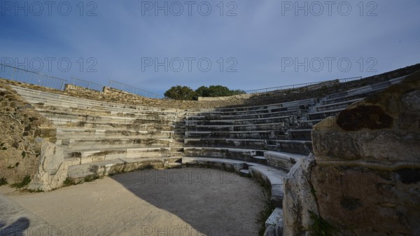 ©Udo Rein, Stone amphitheatre with rows of seats and open area, surrounded by ancient masonry, Ancient Theatre, Kos Town, Kos, Dodecanese, Greek Islands, Greece