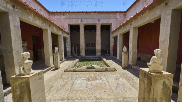 ©Udo Rein, Ancient courtyard with statues and mosaic floor between columns, water basin, Casa Romana, Kos Town, Kos, Dodecanese, Greek Islands, Greece