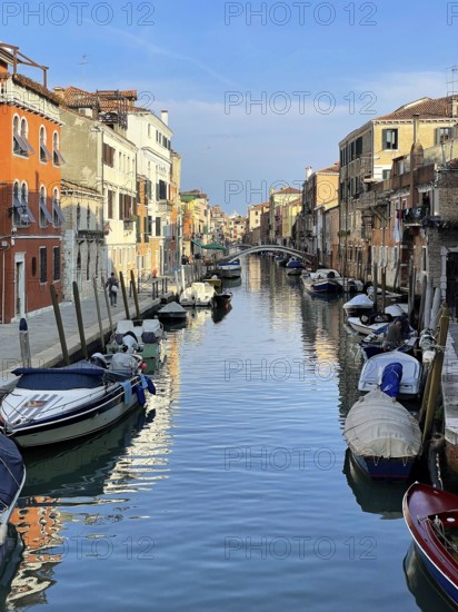 Boats on a canal in Venice, lagoon city of Venice, Veneto, Italy