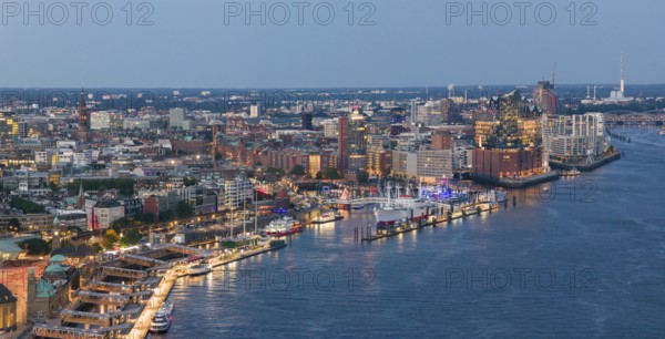 Panoramic aerial view of the Landungsbrücken in the harbour at blue hour with the Elbphilharmonie in the background, Hamburg, Germany