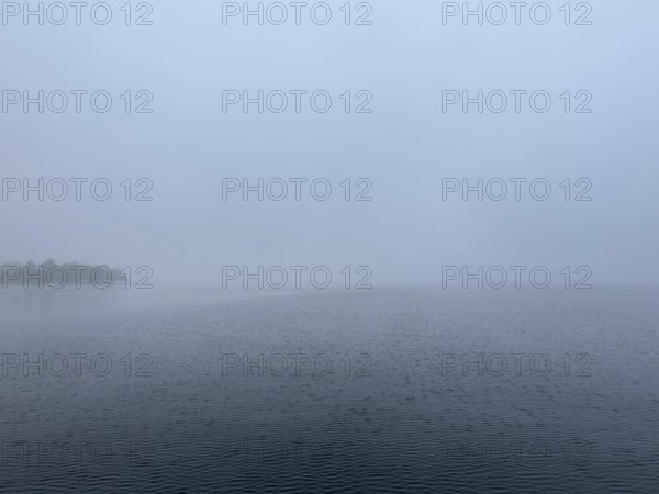 Fog over Lake Starnberg, Bavaria, Germany