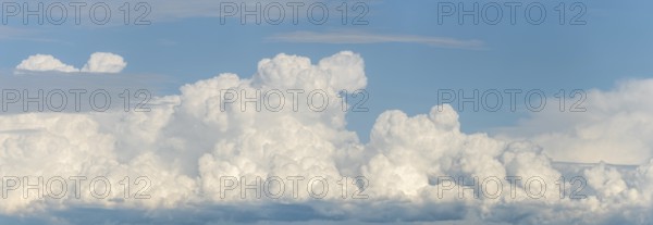 A large cloud in the sky. The sky is blue. The cloud is white.Bas rhin, Alsace, grand est, France
