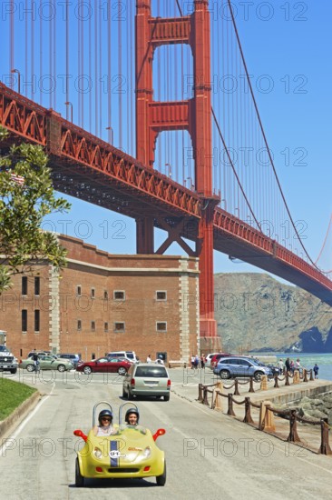 People driving vintage car, San Francisco, California, USA
