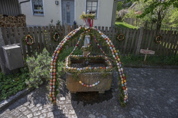 Decorated Easter fountain, tradition in Franconian Switzerland, Bavaria, Germany