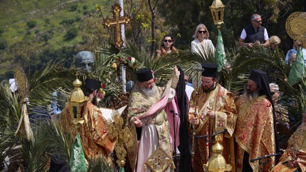 Priests in elaborate robes and incense burners stand in the light of numerous candles during a procession, Orthodox ceremony, monks of St John's Monastery, ceremonial washing of feet, procession, Maundy Thursday, Megali Pempti, Chora, Patmos, Dodecanese, Greek Islands, Greece