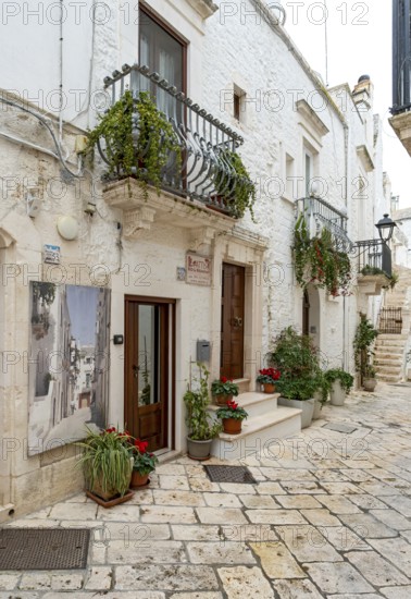 Narrow alley in Locorotondo, Apulia - Puglia, Italy